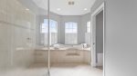 Master bath with walk in shower and jacuzzi tub